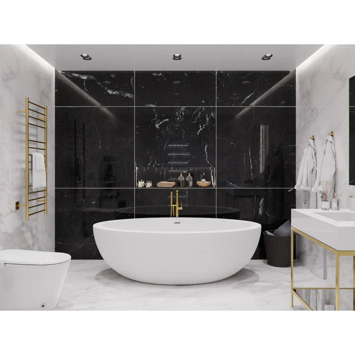 Lusso solid surface center drain freestanding bathtub in matte white styled in a serene bathroom