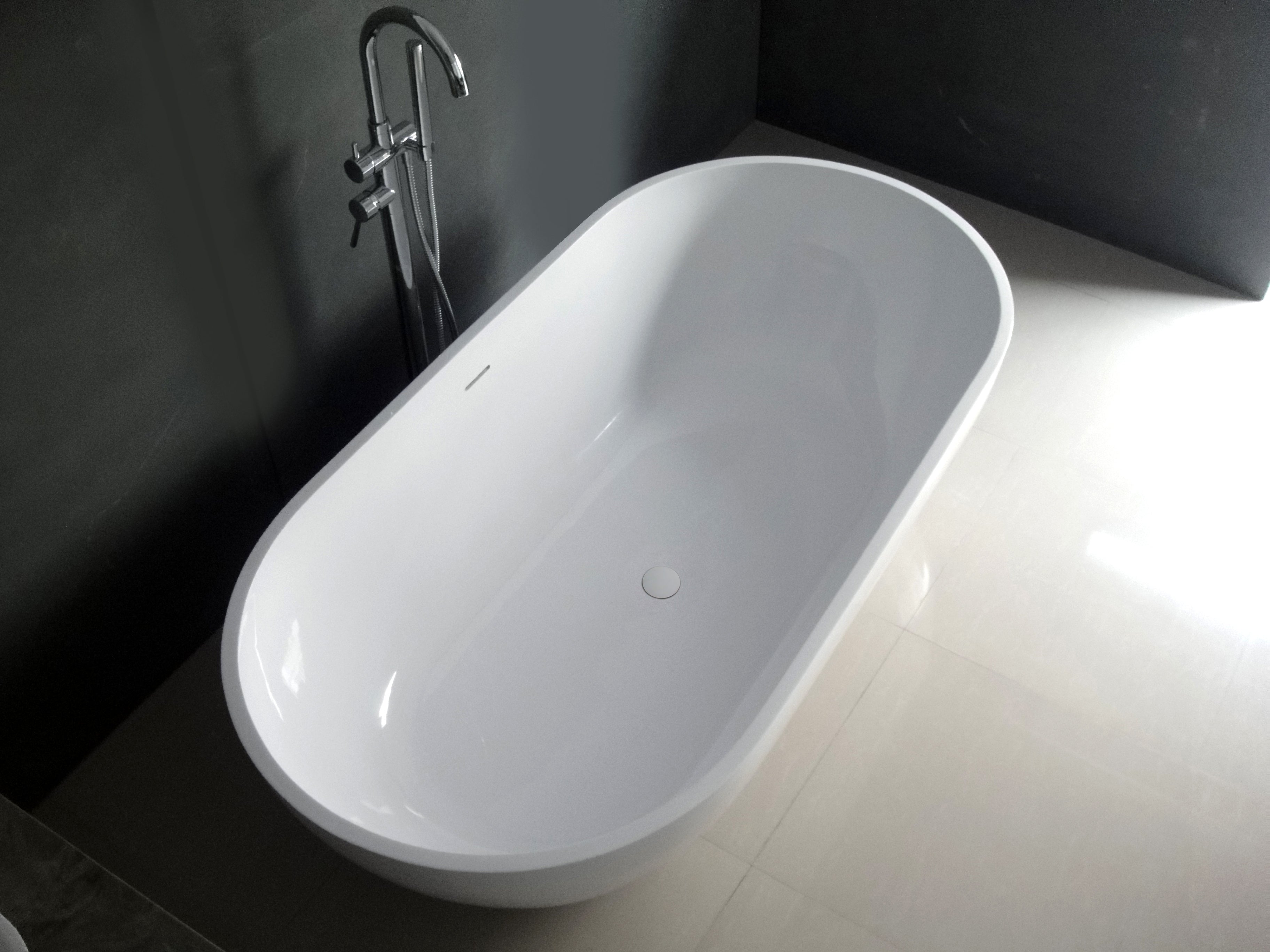 Kingston Brass VRTRS703520 70" Solid Surface Oval Double Ended Freestanding Tub with Drain, Matte White