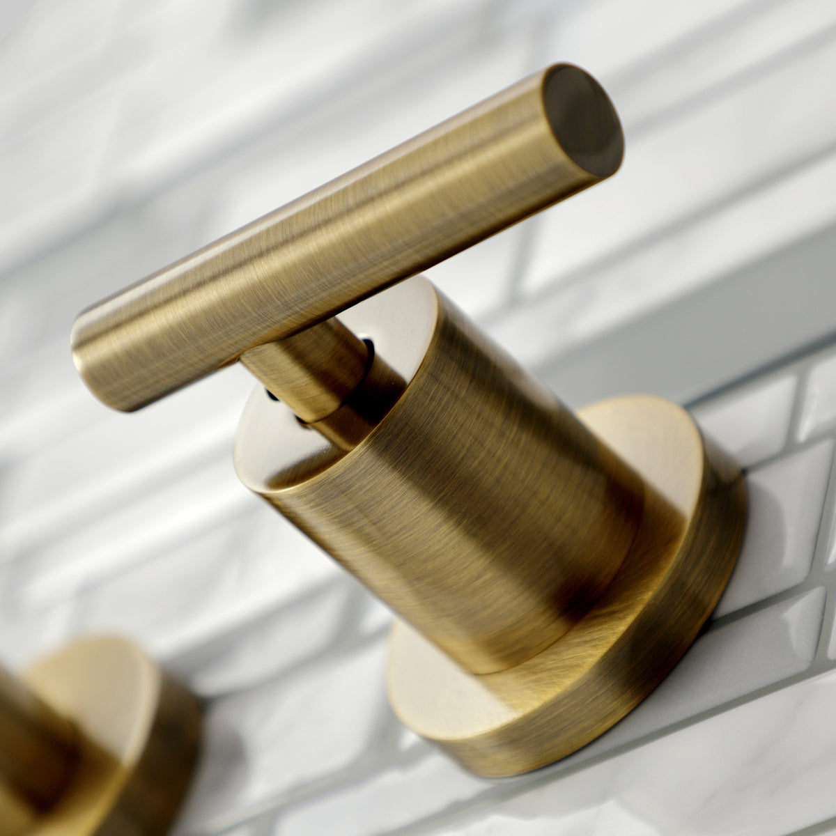 Kingston Brass KS8023CML Manhattan Two-Handle Wall Mount Roman Tub Faucet, Antique Brass
