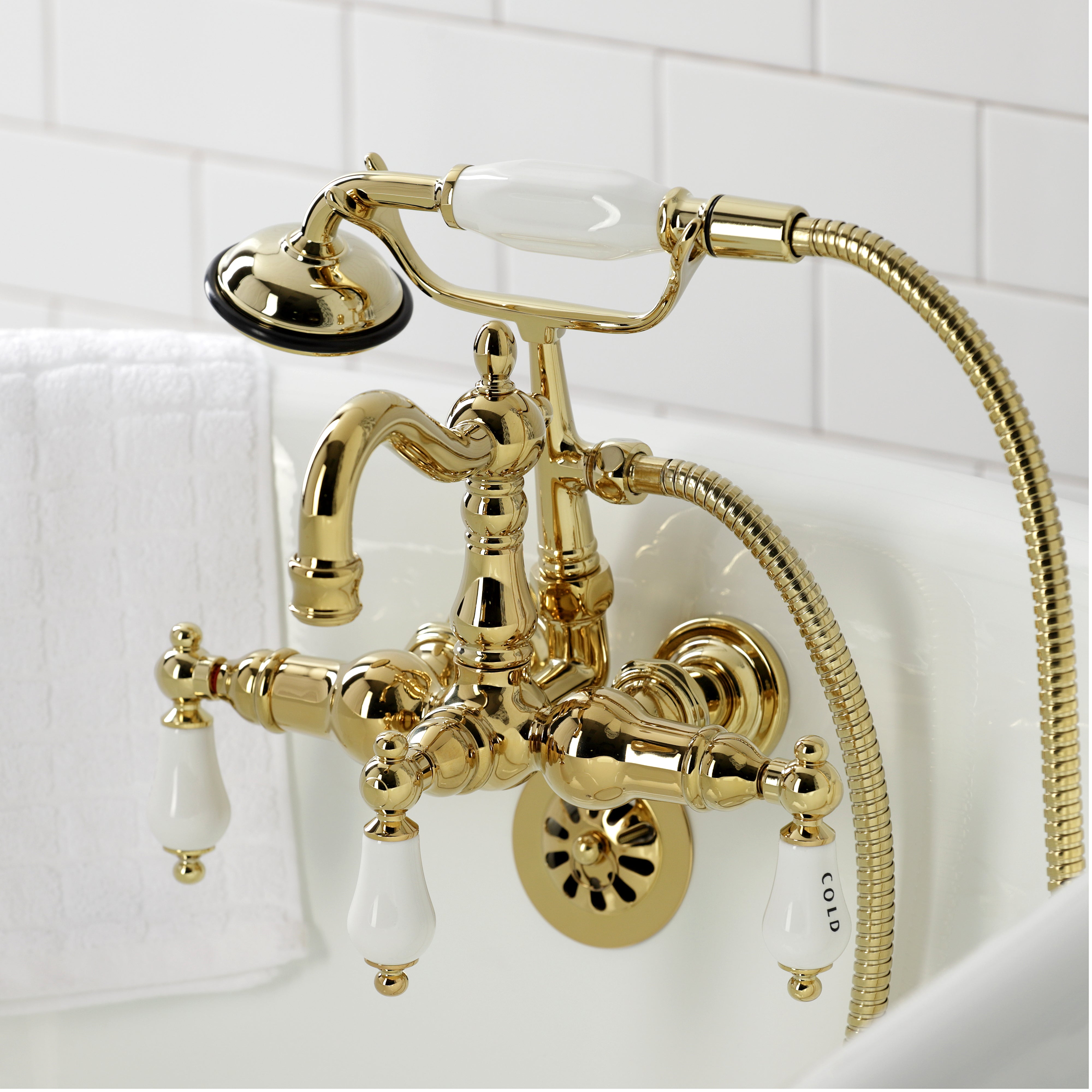 Kingston Brass CA1009T2 Heritage 3-3/8" Tub Wall Mount Clawfoot Tub Faucet with Hand Shower, Polished Brass