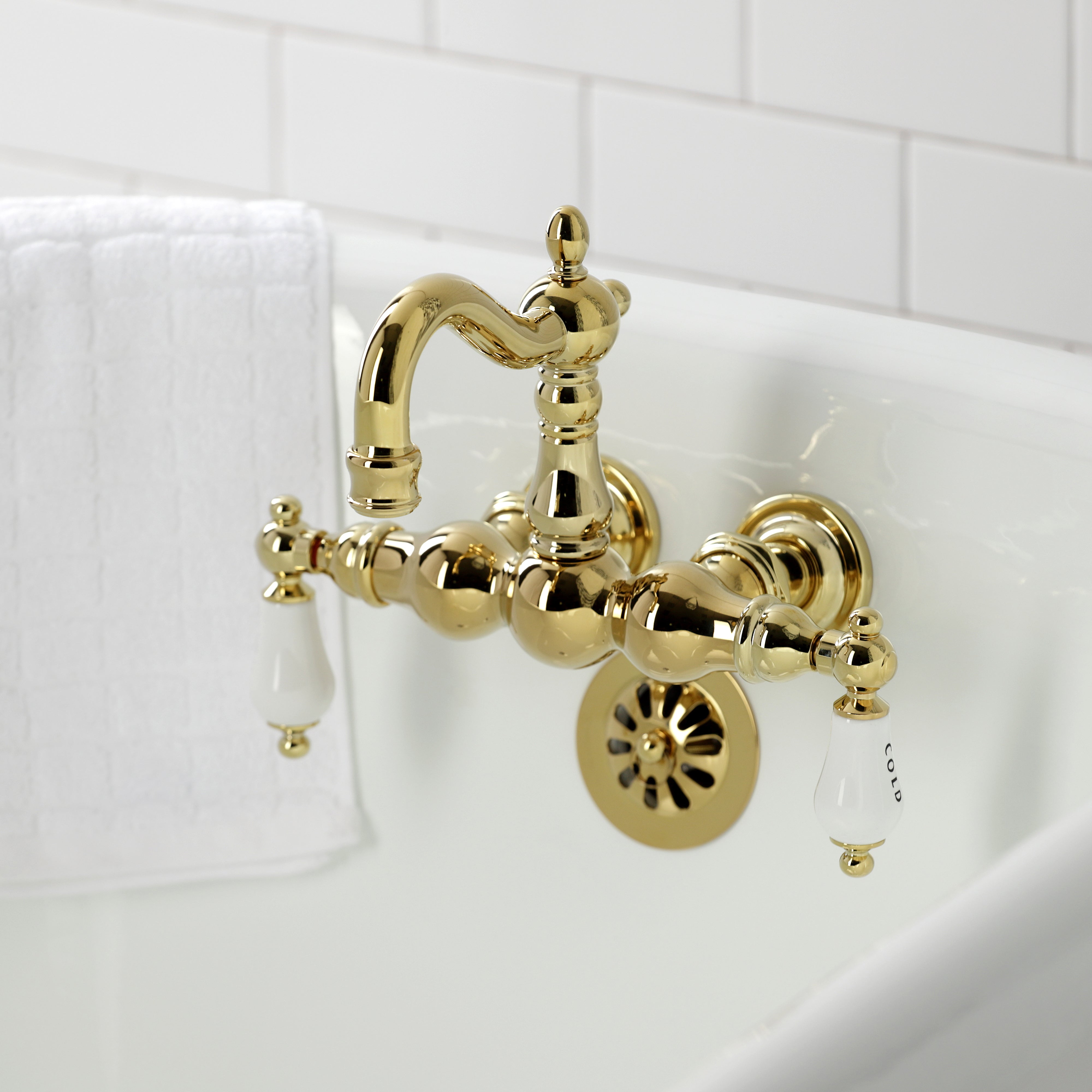 Kingston Brass CA1003T2 Heritage 3-3/8" Tub Wall Mount Clawfoot Tub Faucet, Polished Brass
